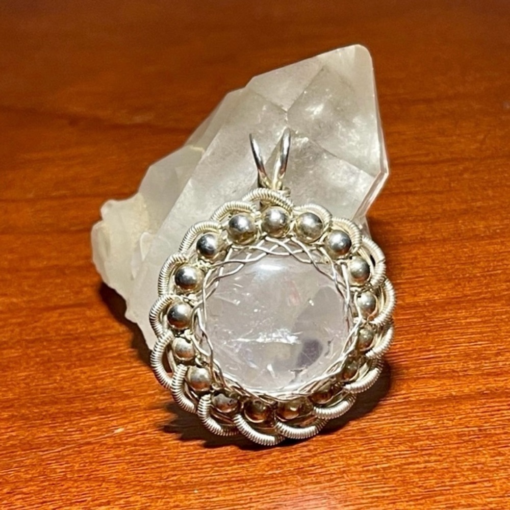 CRYSTAL QUARTZ AND STERLING SILVER PENDANT